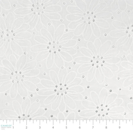 White fabric with a subtle geometric pattern on a white background