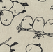 close up of fabric with little chicks on a branch in simple line drawing of black on  a natural background