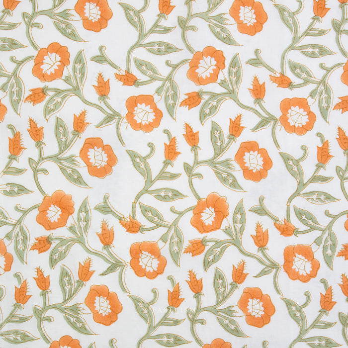 Pattern of orange flowers with green leaves on a light blue background