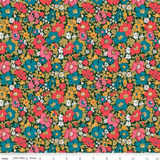 Floral fabric pattern with pink, blue, and green flowers on a dark background