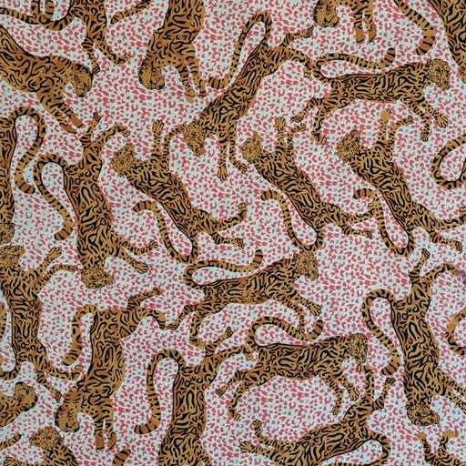 Close up of fabric print with Leopards on Red Leopard Spots