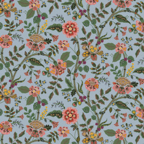Floral pattern with colorful flowers and leaves on a light blue background