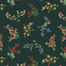 Floral pattern with red, blue, and pink flowers on a dark green background